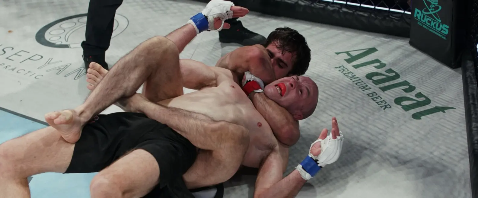 Artur Arutyunyan locks in a rear naked choke